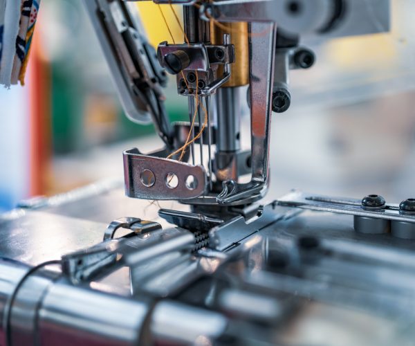 professional-sewing-machine-close-up-modern-textile-industry-